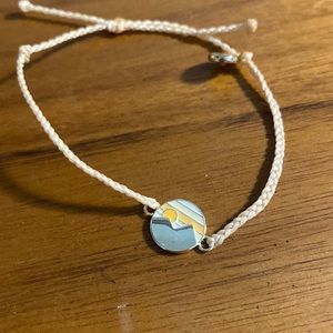 Light pink bracelet with mountain range charm